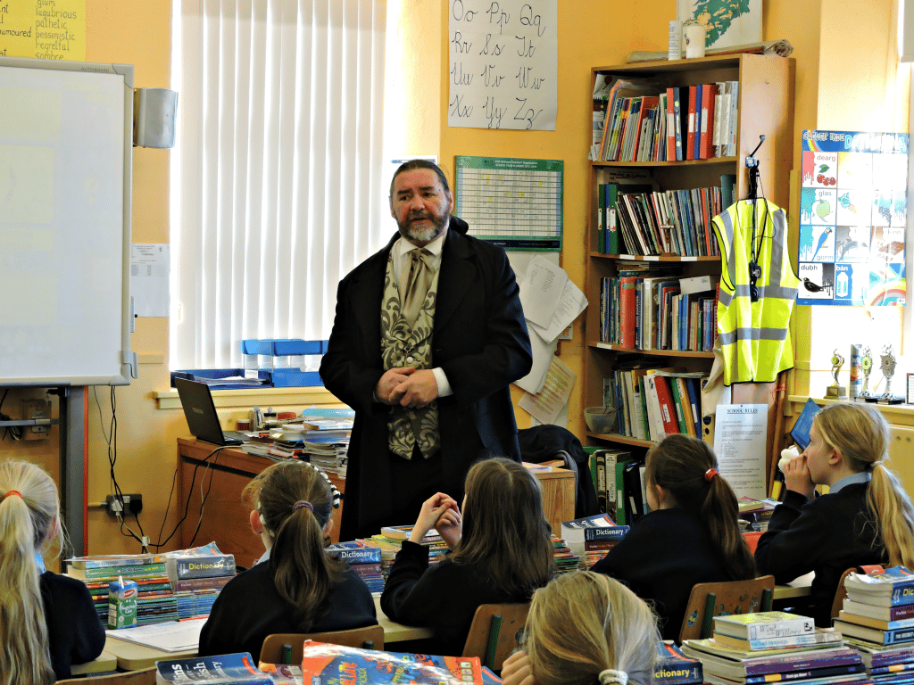 A historian speaking to pupils at Stradbally National School